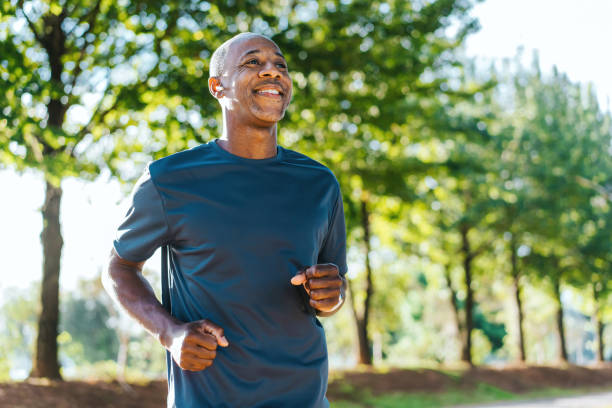 Portrait of a mature man running in the public park