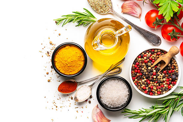 Huile d'olive et épices avec curcuma et herbes aromatiques