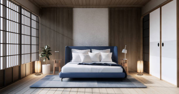 Wabi sabi bed and decoartion plants in japanese bedroom.
