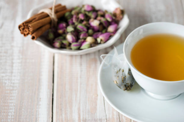 Herbal tea with tea ingredients like dry rose and cinnamon.